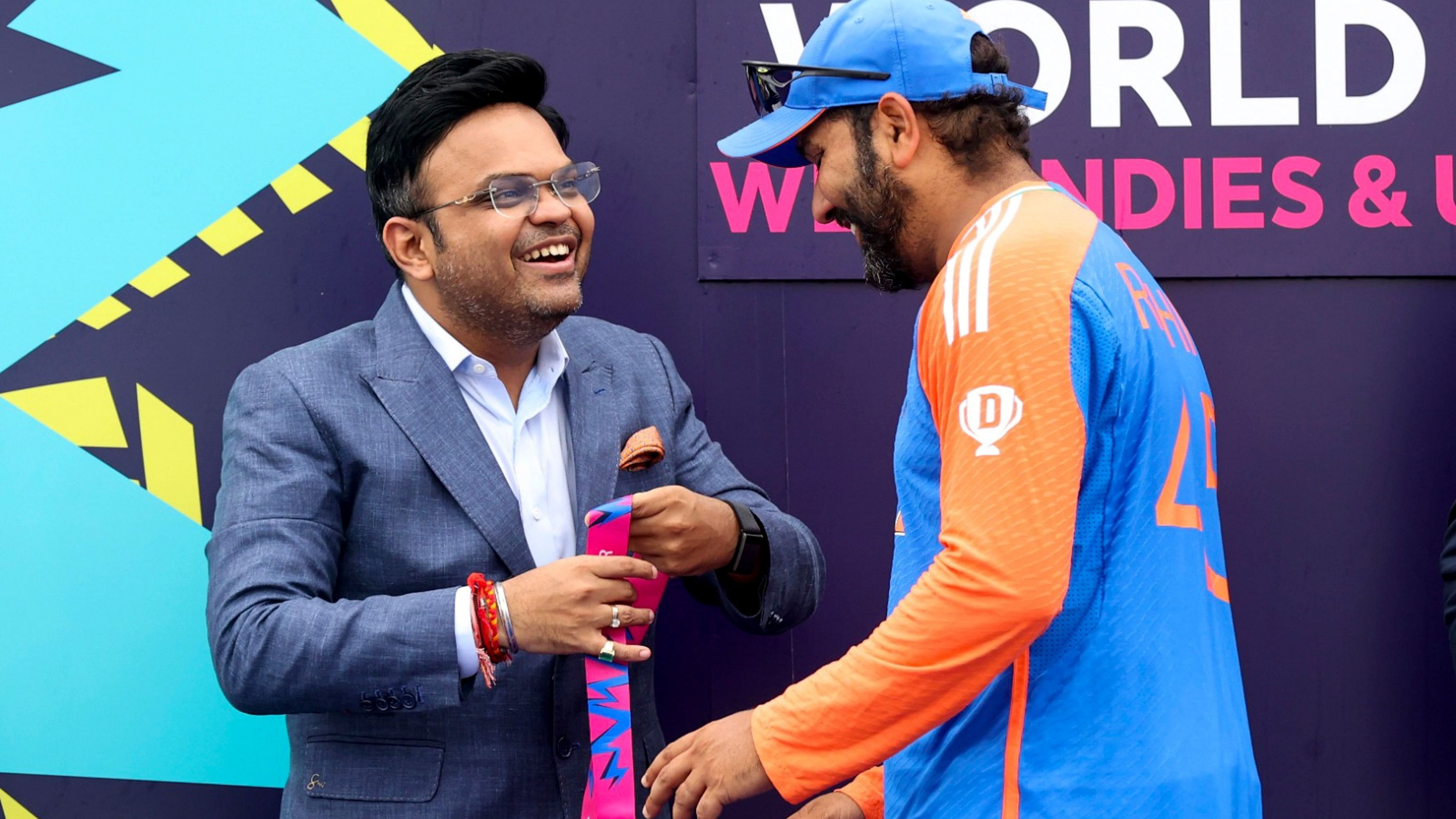 <div class="paragraphs"><p> India's captain Rohit Sharma receives a championship medal from BCCI Secretary Jay Shah during presentation ceremony after India defeated South Africa in the ICC Men's T20 World Cup final cricket match, at Kensington Oval, in Bridgetown, Barbados, Sunday, June 30, 2024. </p></div>