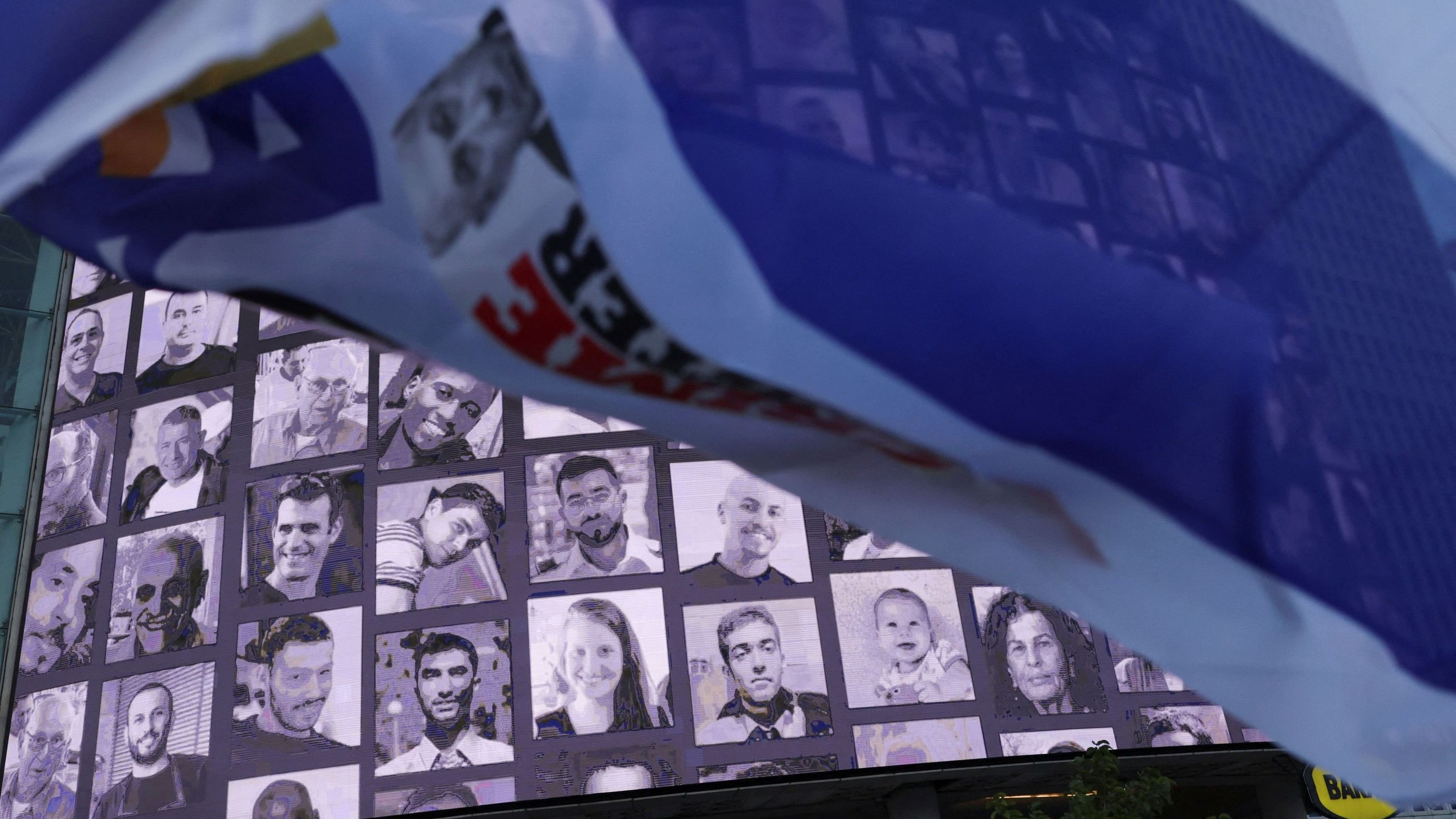 <div class="paragraphs"><p>An Israeli flag with an image Israeli Prime Minister Benjamin Netanyahu flies, as people attend a demonstration against Netanyahu's government and a call for the release of hostages in Gaza, amid the Israel-Hamas conflict, in Tel Aviv, Israel, July 20, 2024. </p></div>