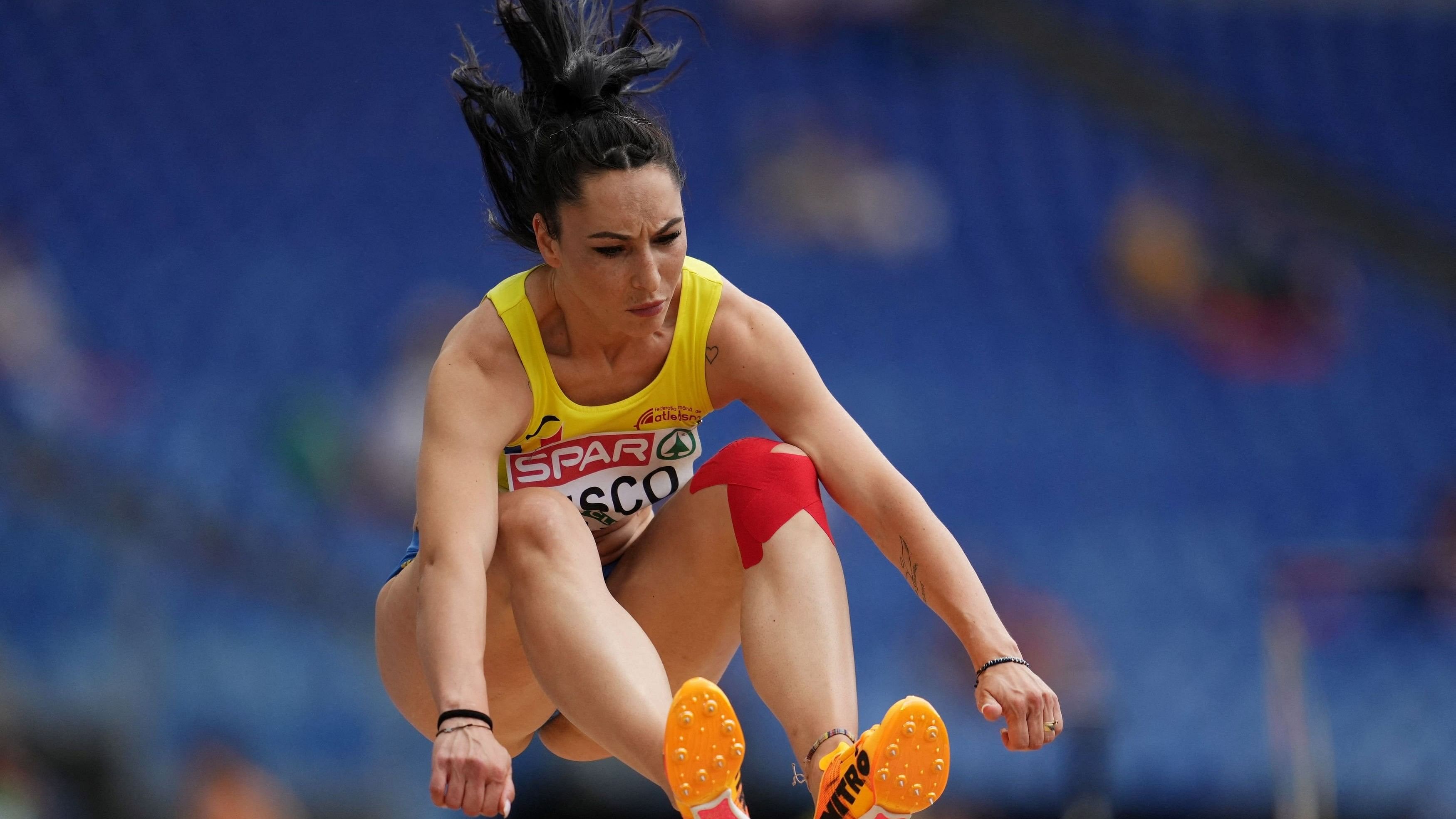 <div class="paragraphs"><p> Romania's Florentina Costina Iusco in action during the women's long jump qualification.</p></div>