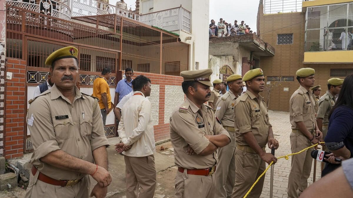 <div class="paragraphs"><p>Police personnel in Hathras. (Representative image)</p></div>