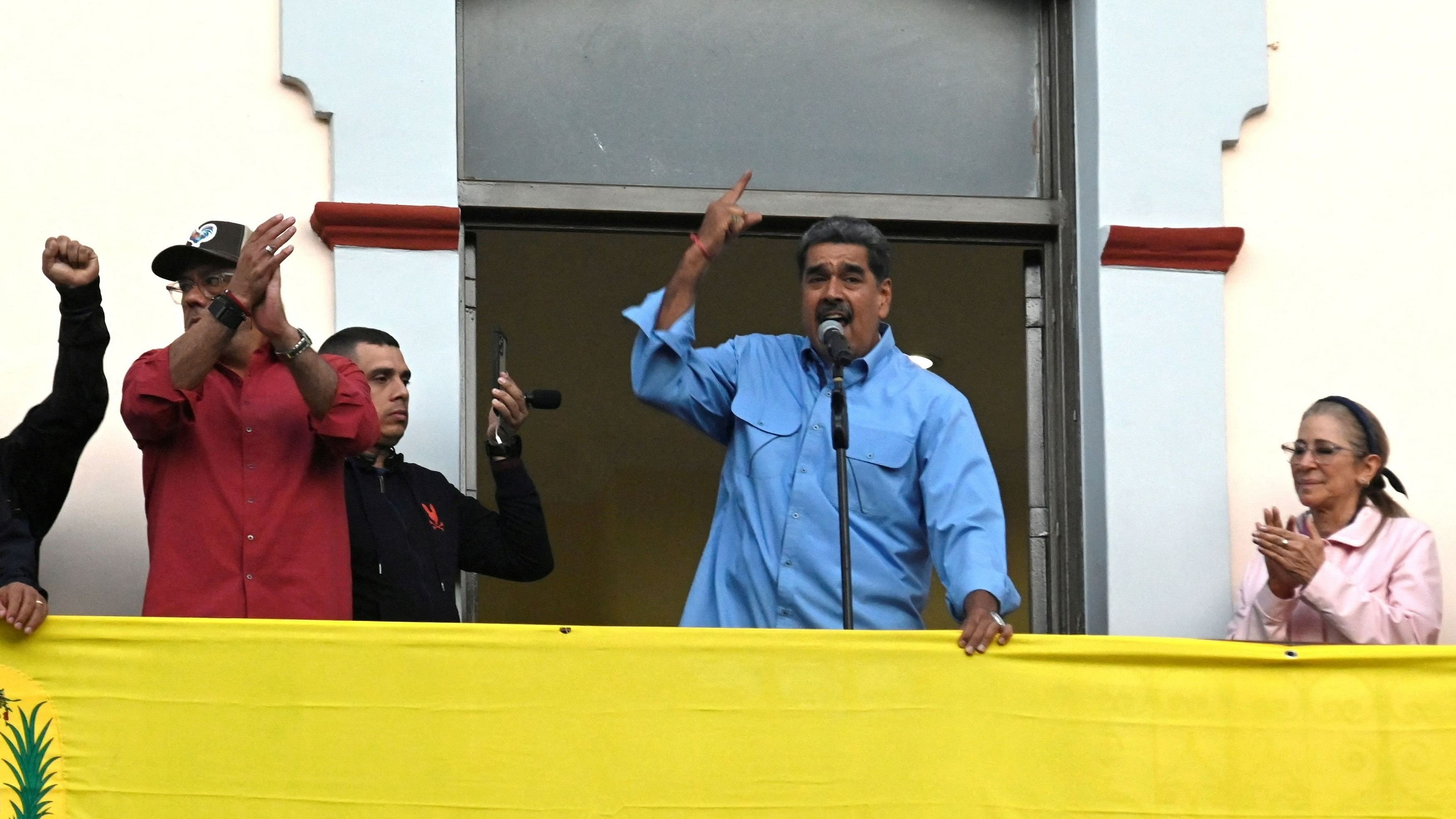 <div class="paragraphs"><p>Venezuelan President Nicolas Maduro talks to supporters from a balcony at Miraflores Palace after the presidential election, in Caracas, Venezuela July 30, 2024. </p></div>