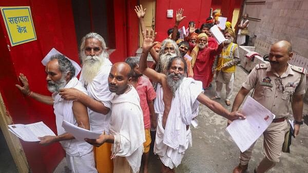 <div class="paragraphs"><p>Pilgrims wait in a queue to get themselves registered for the annual Amarnath Yatra, in Jammu, Monday, July 1, 2024.</p></div>