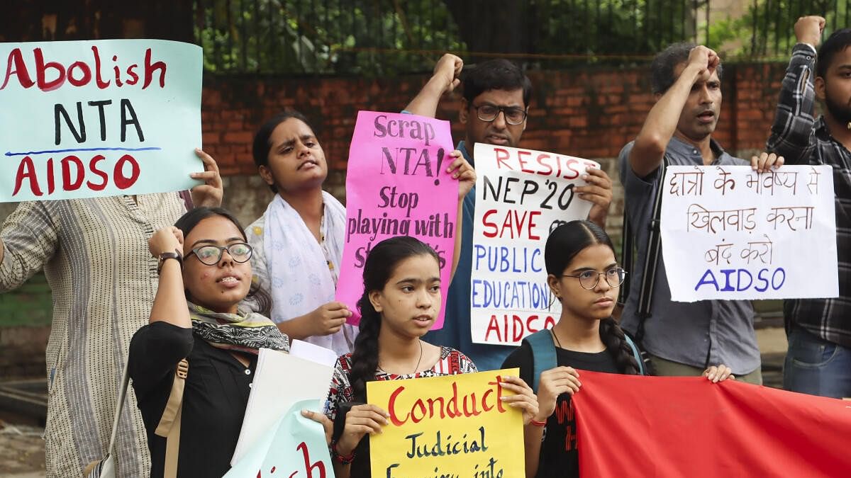 <div class="paragraphs"><p>Activists protest against the National Testing Agency over the alleged irregularities in NEET-UG exams 2024 at Janter Manter, in New Delhi.</p></div>