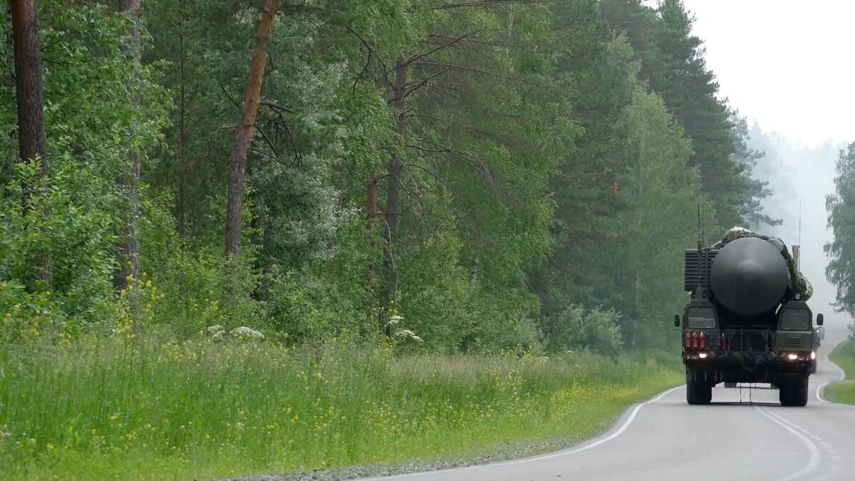 <div class="paragraphs"><p>A Russian Yars intercontinental ballistic missile system drives along a road during drills in an undisclosed location in Russia, in this still image taken from handout footage released July 5, 2024.</p></div>