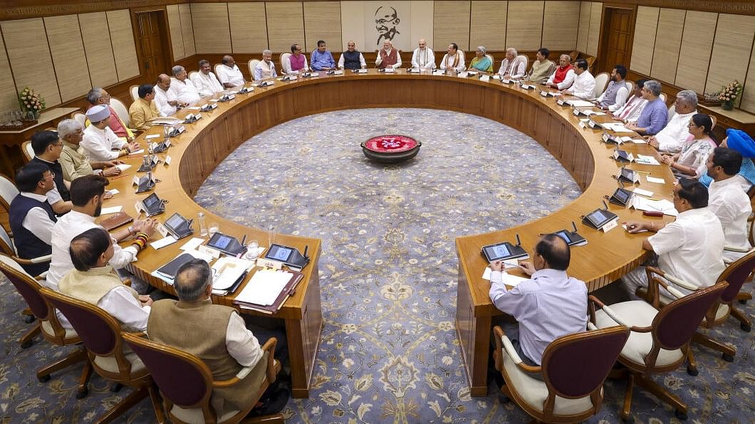 <div class="paragraphs"><p>File photo of Prime Minister Narendra Modi chairing the first meeting of his new Cabinet, attended by the newly-inducted ministers, at the prime minister's 7, Lok Kalyan Marg residence, in New Delhi.</p></div>