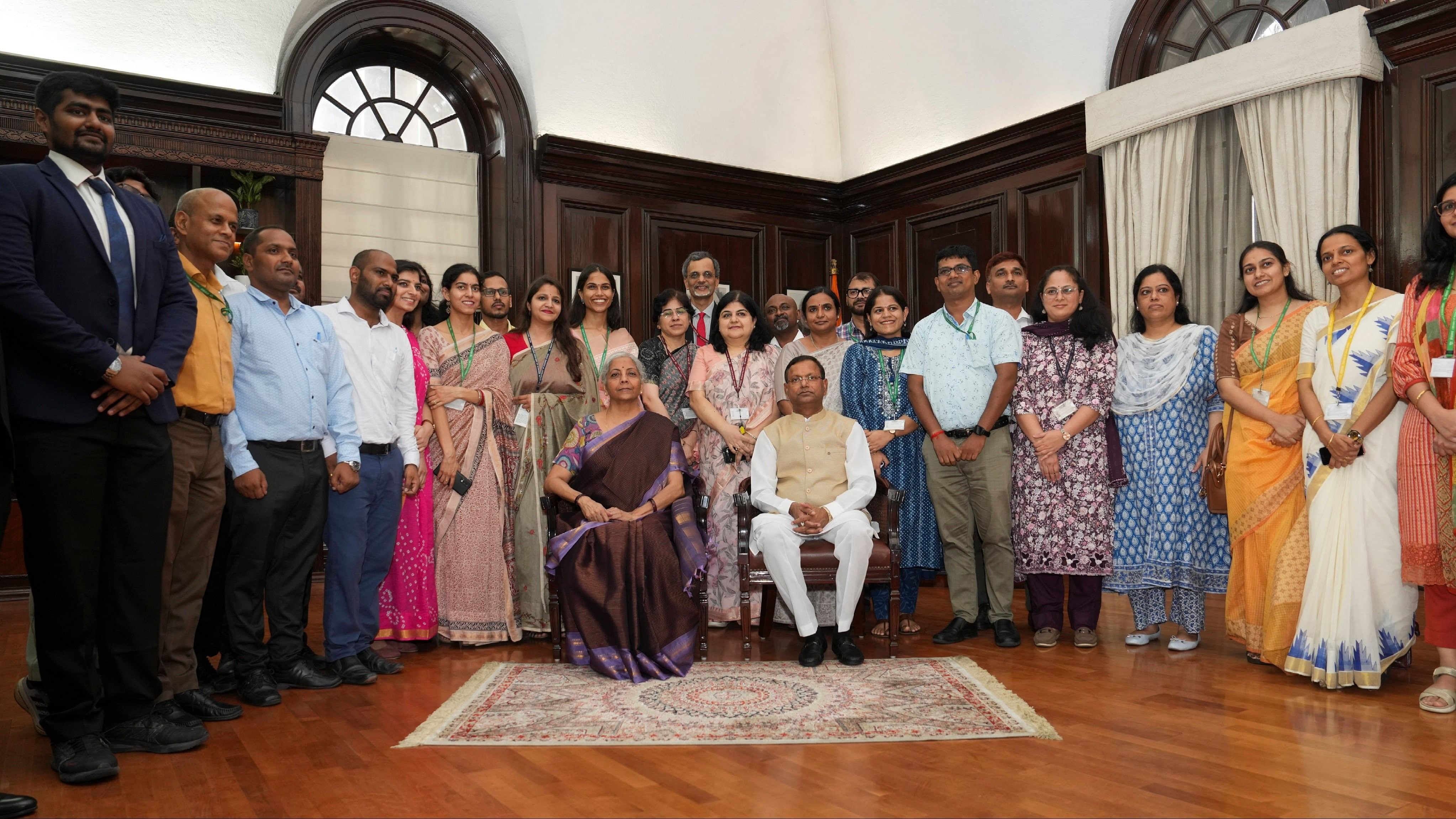 <div class="paragraphs"><p>Finance Minister Nirmala Sitharaman with her team.</p></div>