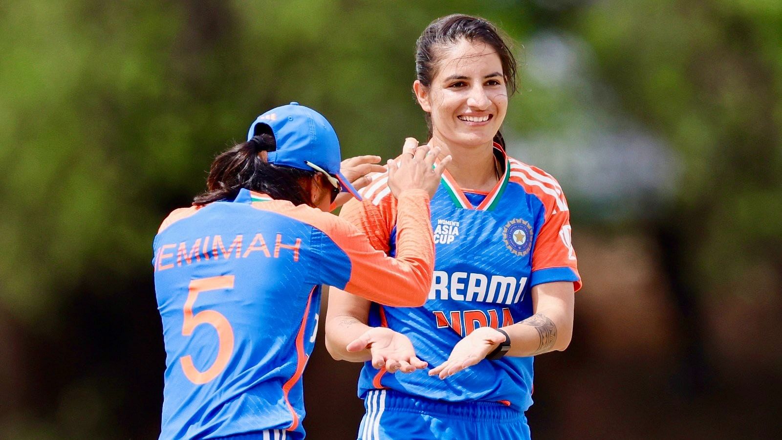 <div class="paragraphs"><p>Indian women's team players celebrating their victory.</p></div>