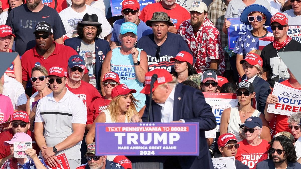 <div class="paragraphs"><p>Republican presidential candidate and former US President Donald Trump reacts after gunfire rang out during a campaign rally at the Butler Farm Show in Butler, Pennsylvania, US, July 13, 2024. </p></div>