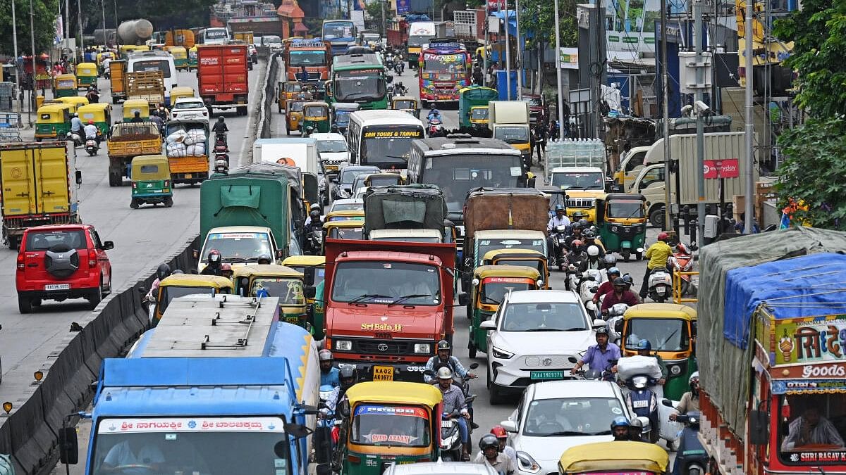 <div class="paragraphs"><p>Slow-moving traffic crawls on Mysuru Road in Bengaluru.</p></div>