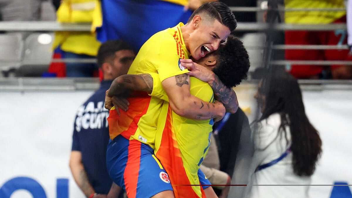 <div class="paragraphs"><p>Colombia forward Luis Diaz (7) celebrates with midfielder James Rodriguez (10) after scoring a goal in the Copa America Quarterfinal against the Panama at State Farm Stadium. </p></div>