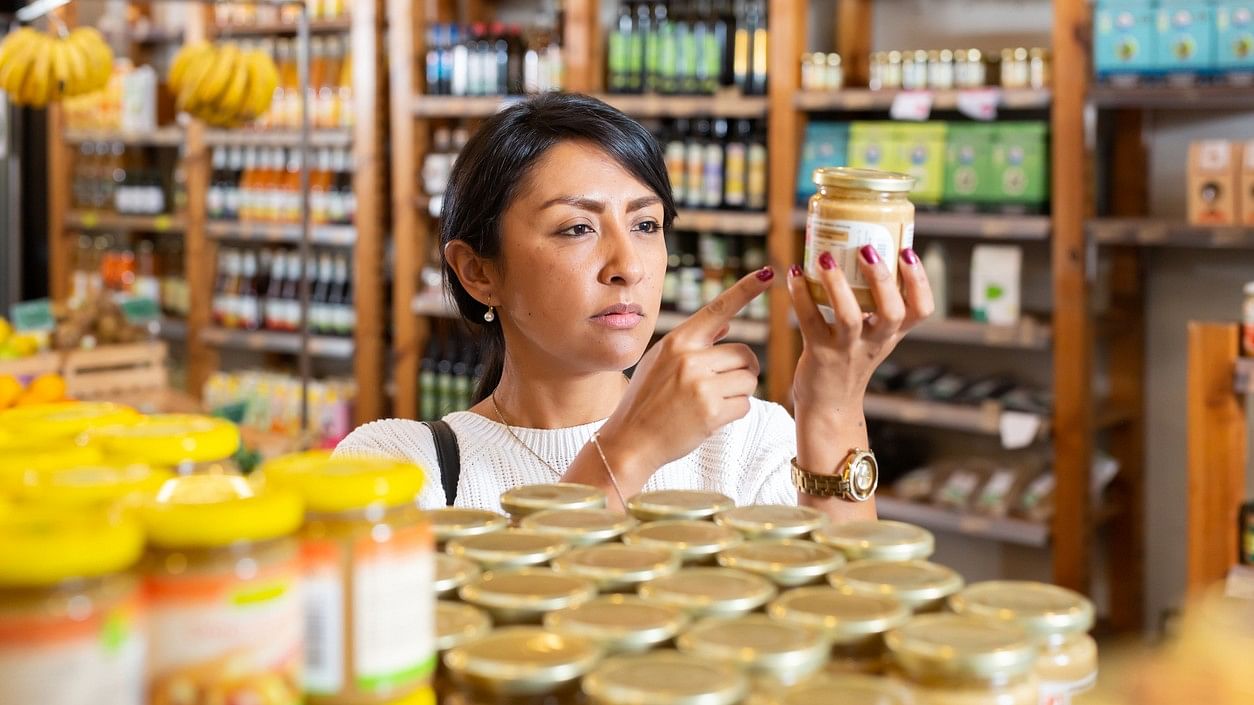 <div class="paragraphs"><p>Representative image showing a woman checking product label.</p></div>