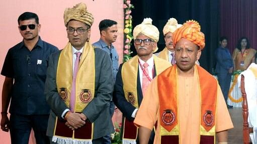 <div class="paragraphs"><p>Chief Justice of India DY Chandrachud and UP Chief Minister Yogi Adityanath at the annual convocation ceremony of Dr. Ram Manohar Lohia National Law University in the Ambedkar Auditorium, in Lucknow.&nbsp;</p></div>