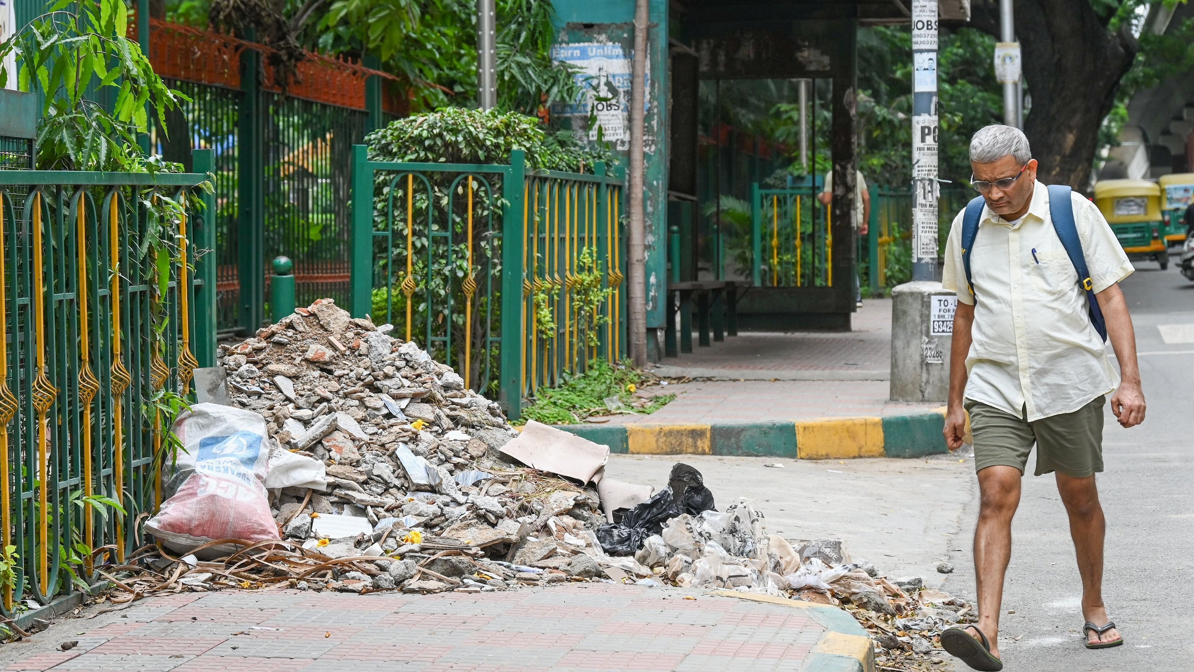 <div class="paragraphs"><p>A footpath at Ranadheera Kanteerava Park, RV Road, blocked by construction debris. This forces pedestrians to jump off the sidewalk, which can prove dangerous.&nbsp;</p></div>