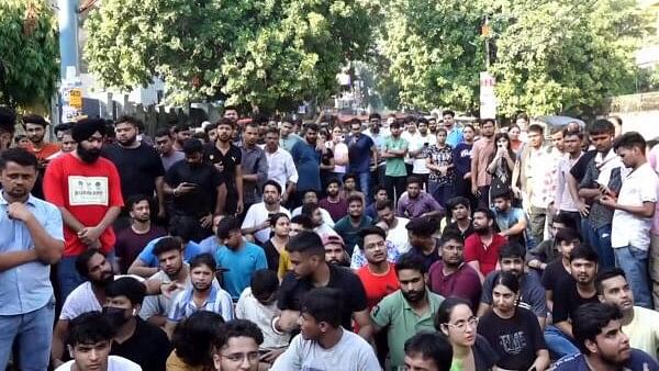 <div class="paragraphs"><p>Students stage a protest over the death of three civil services aspirants after the basement of a coaching centre was flooded following heavy rain, in New Delhi.</p></div>