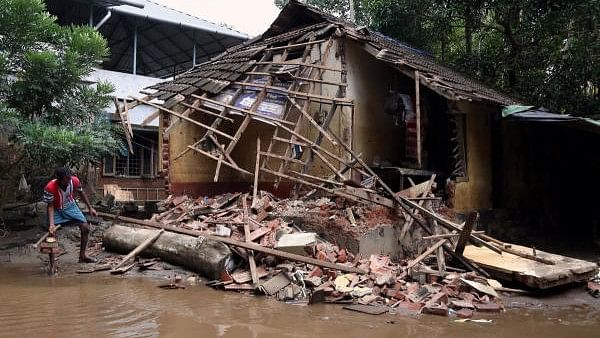 <div class="paragraphs"><p>Representative image of a collapsed house.</p></div>