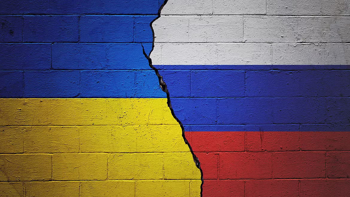 <div class="paragraphs"><p>Cracked brick wall painted with a Ukrainian flag on the left and a Russian flag on the right. Representative image.</p></div>