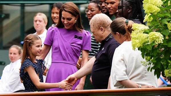 <div class="paragraphs"><p>Britain's Kate, Princess of Wales and Princess Charlotte meet ground staff day fourteen of the 2024 Wimbledon Championships at the All England Lawn Tennis and Croquet Club, London, Britain, ahead of Kate presenting the trophy to the winner of the men's final. </p></div>