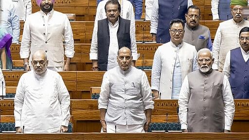 <div class="paragraphs"><p>Amit Shah with&nbsp;PM Modi, Rajnath Singh and other leaders in the Lok Sabha on July 22</p></div>