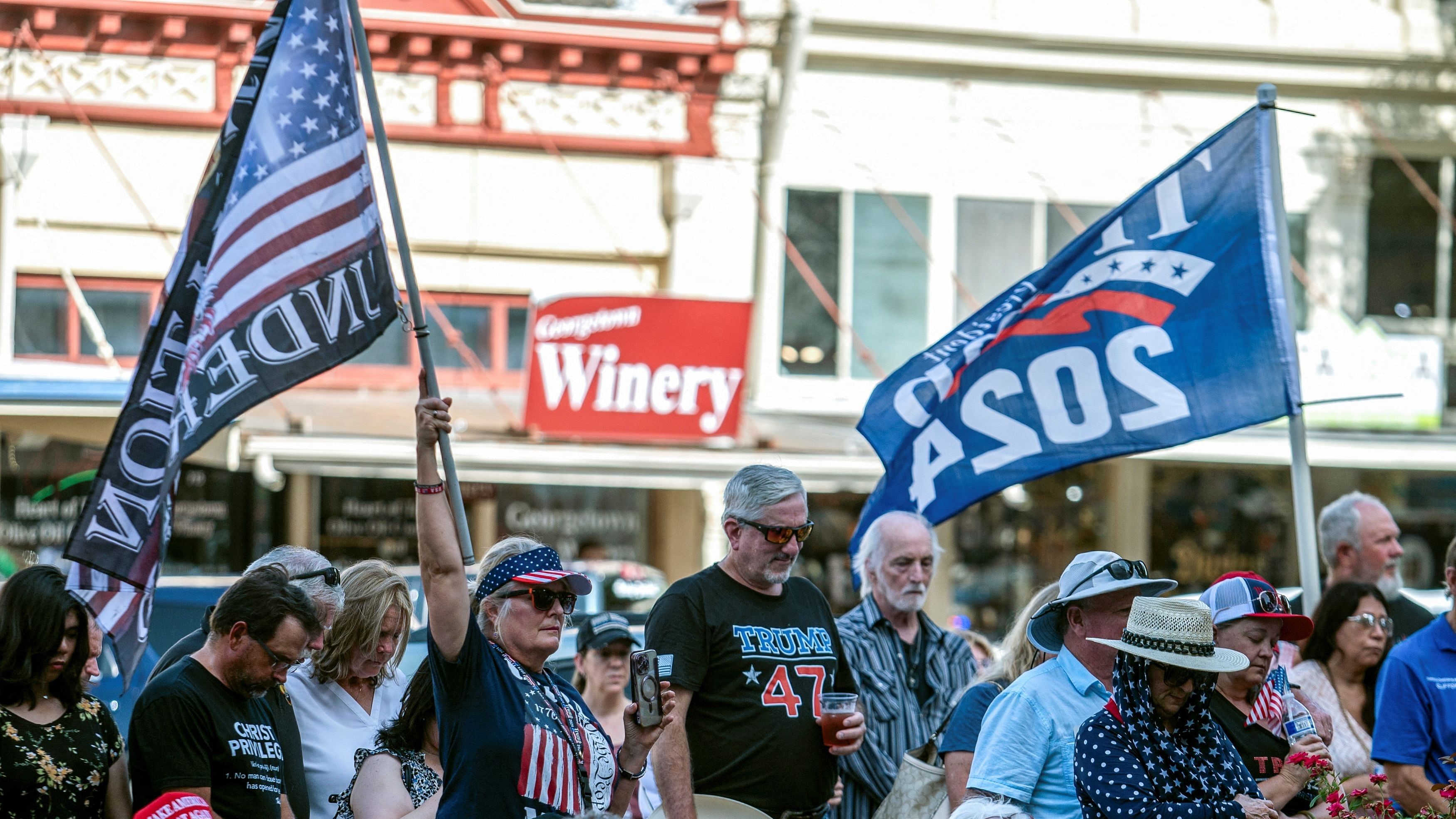 <div class="paragraphs"><p>Supporters gather at a prayer rally in support of former US President Donald Trump, who was shot the previous day in an assassination attempt during a rally in Pennsylvania, in Georgetown, Texas, July 14, 2024.</p></div>