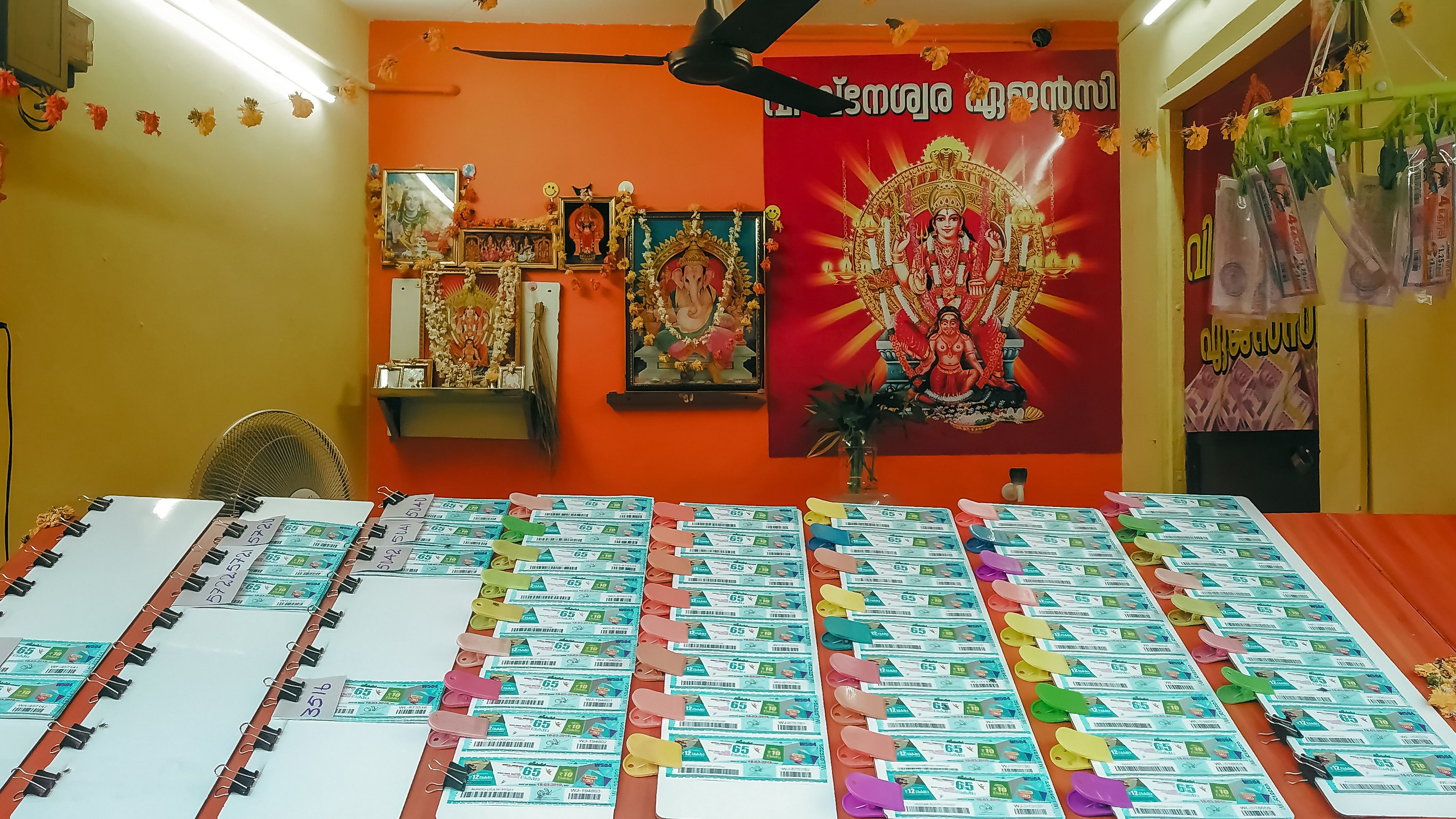 <div class="paragraphs"><p>Lottery tickets on display at a lottery selling agency in Kerala.</p></div>