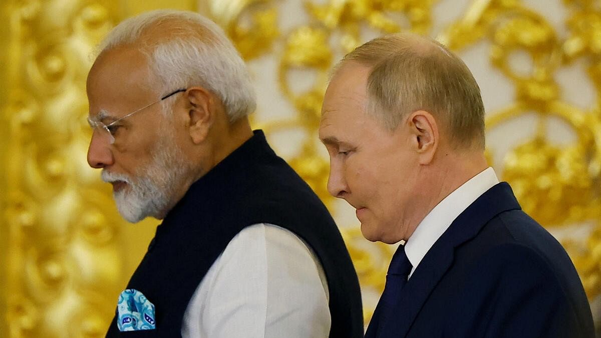 <div class="paragraphs"><p>PM Modi (left) with Vladimir Putin.</p></div>