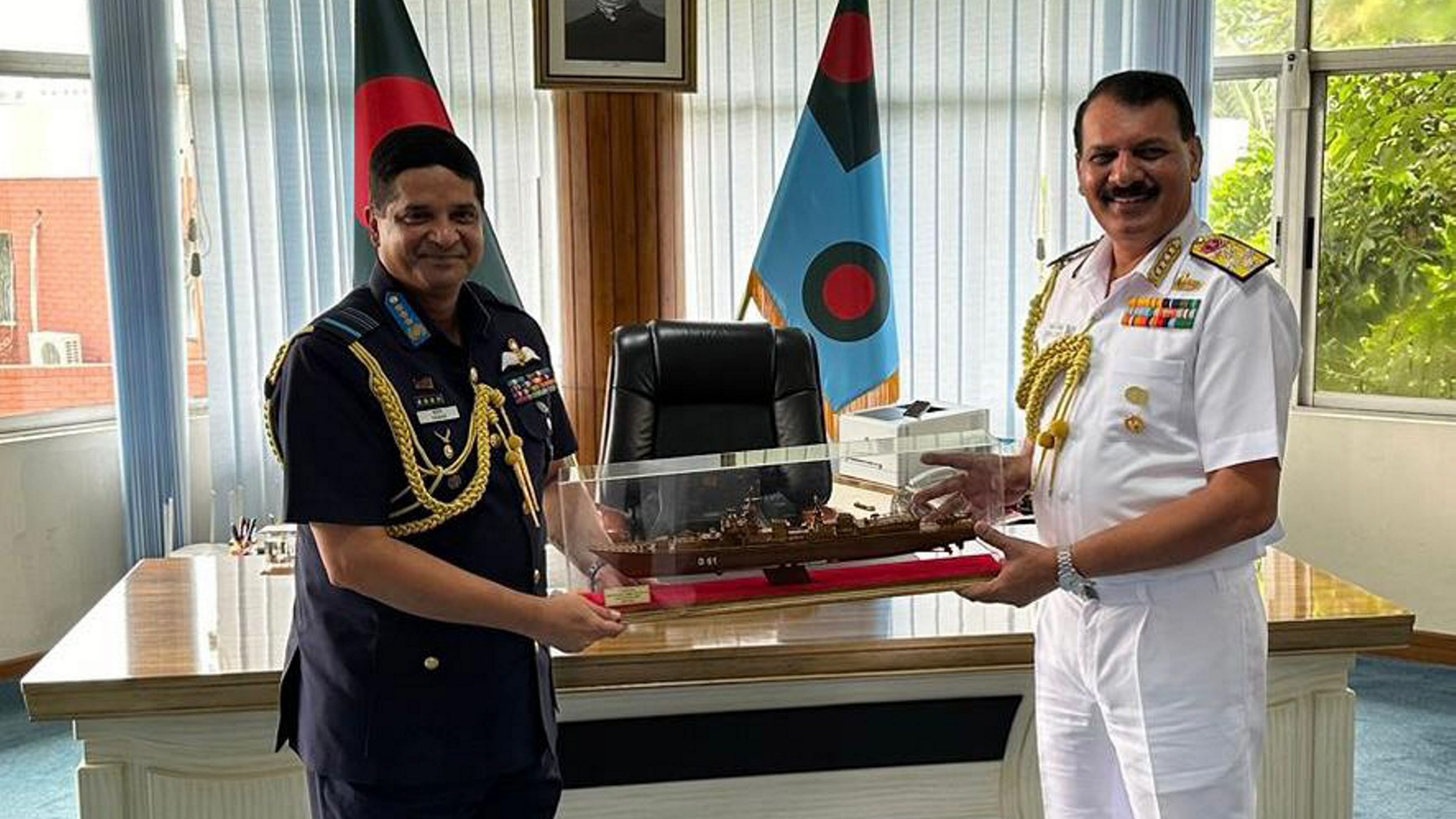 <div class="paragraphs"><p>Chief of the Naval Staff (CNS) Admiral Dinesh K Tripathi during a meeting with Chief of the Air Staff of Bangladesh Air Force Air Marshal Hasan Mahmood.</p></div>