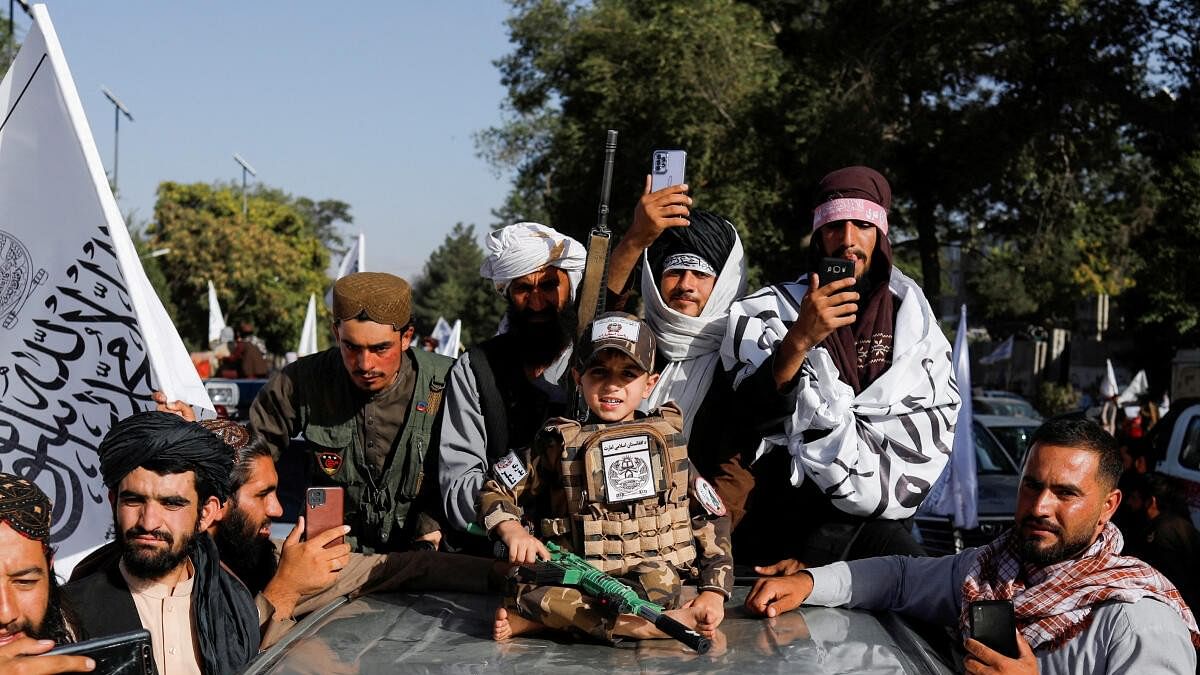 <div class="paragraphs"><p> Taliban supporters celebrate on the second anniversary of the fall of Kabul at a street near the US embassy in Kabul</p></div>