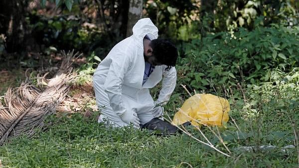 <div class="paragraphs"><p>A health official painfully reacts on the ground while he was collecting samples from villagers during the curfew amid concerns about the spread of coronavirus disease (COVID-19), in Colombo, Sri Lanka.&nbsp;</p></div>