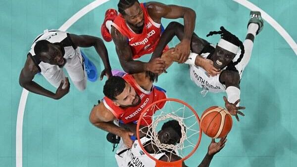 <div class="paragraphs"><p>Jt Thor, Wenyen Gabriel, Majok Deng of South Sudan, and Arnaldo Toro and Davon Reed of Puerto Rico in action, in Olympics 2024.</p></div>