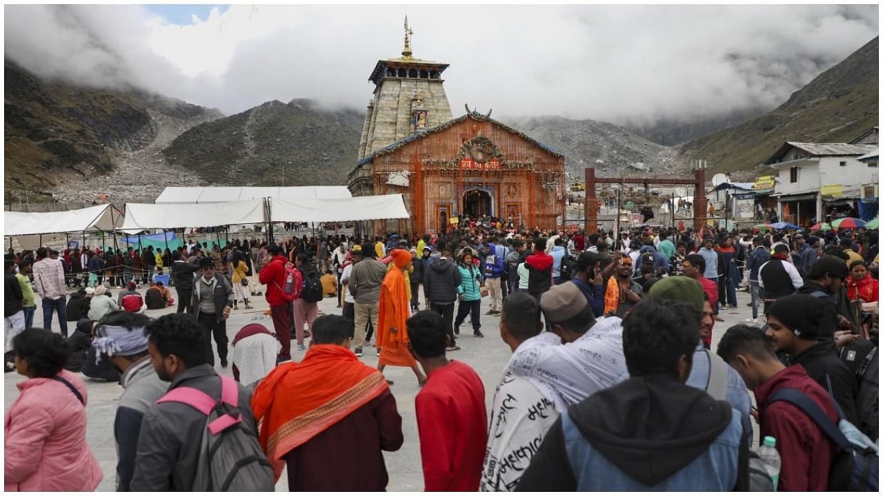 <div class="paragraphs"><p>Rudraprayag: Devotees at Kedarnath Temple, in the backdrop of the Himalayan mountain range, in Rudraprayag district.&nbsp;</p></div>