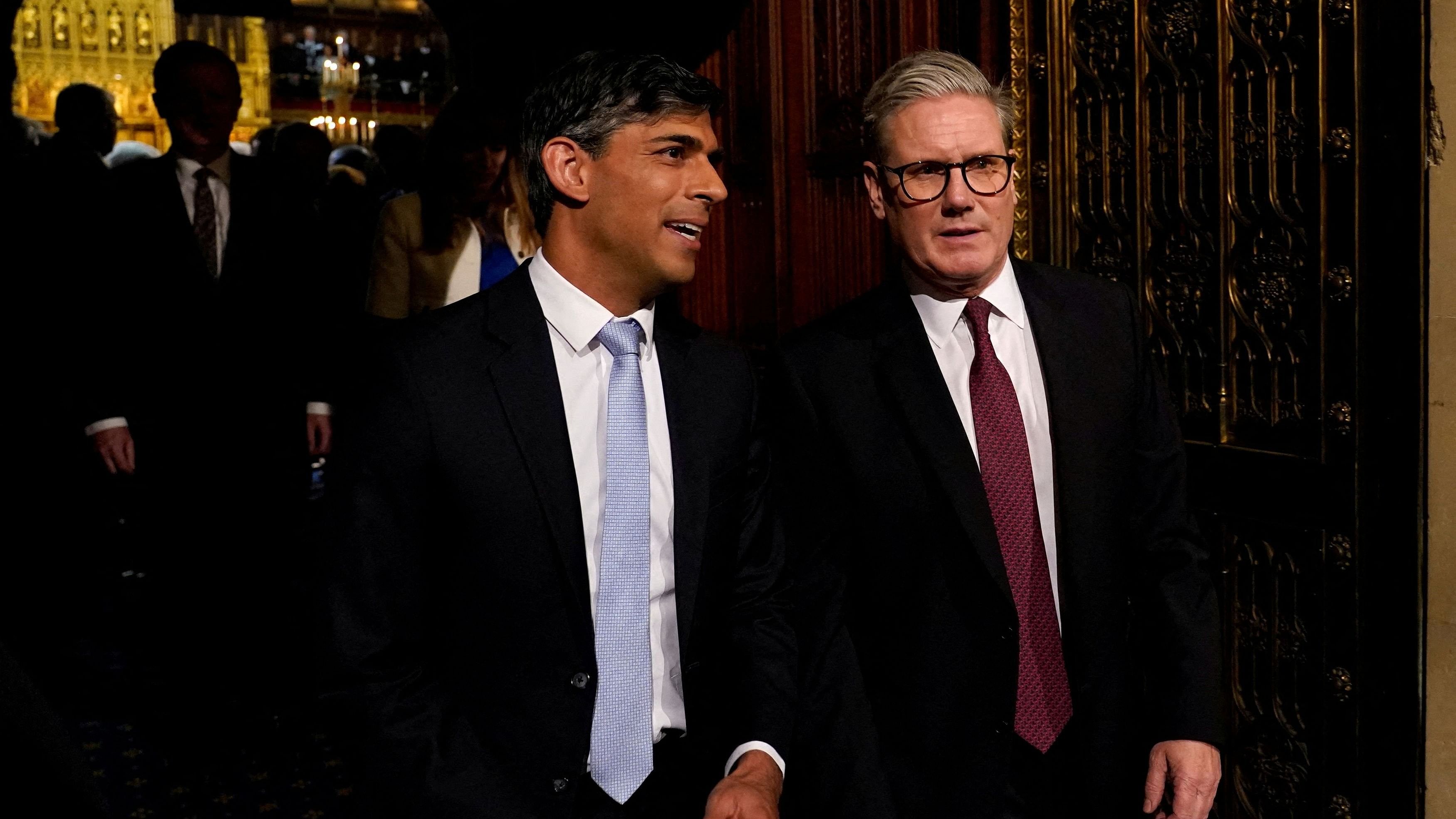 <div class="paragraphs"><p>Prime Minister Keir Starmer and former Prime Minister Rishi Sunak talk as they walk at the House of Lords after listening to the King's Speech during the State Opening of Parliament in the London, Britain, July 17, 2024.   </p></div>