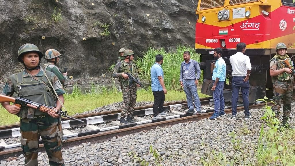 <div class="paragraphs"><p>Damaged track being inspected.</p></div>