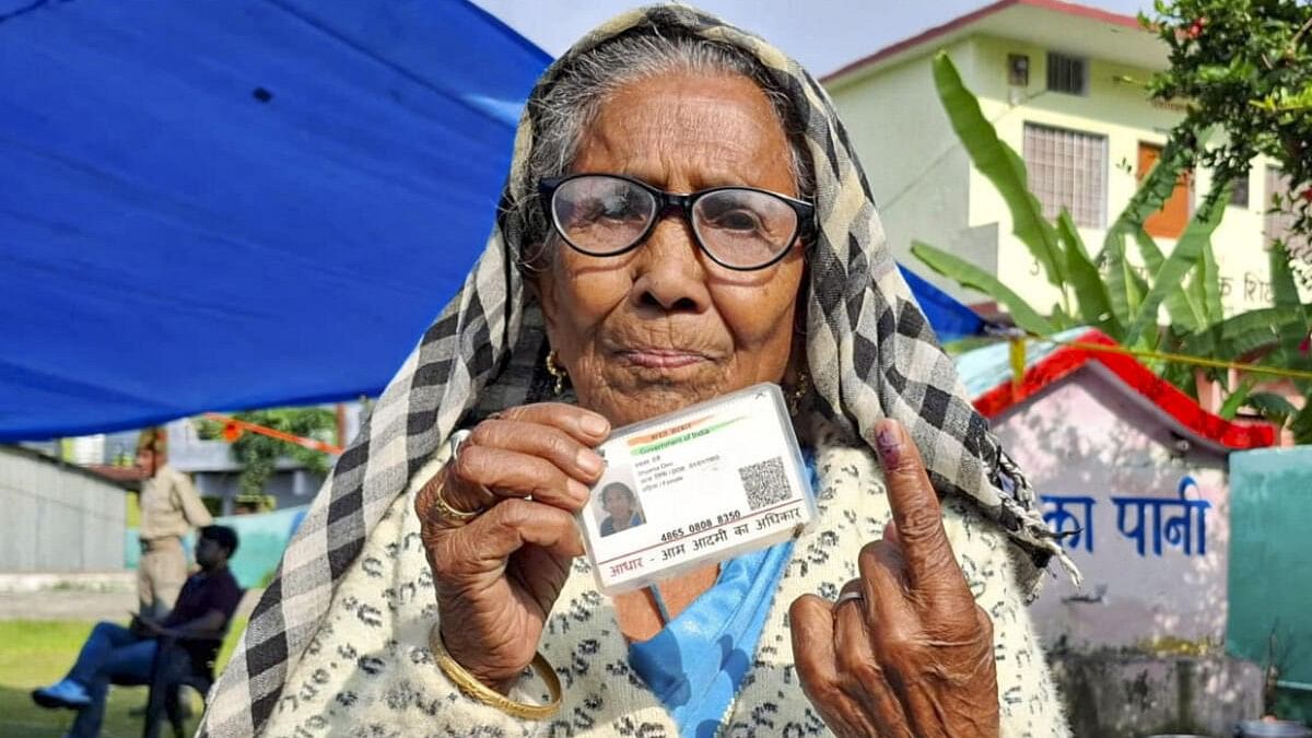 <div class="paragraphs"><p>An elderly woman shows her finger marked with indelible ink after casting vote during the Uttarakhand Assembly bypolls, in Chamoli district, Wednesday on&nbsp; July 10, 2024.</p></div>