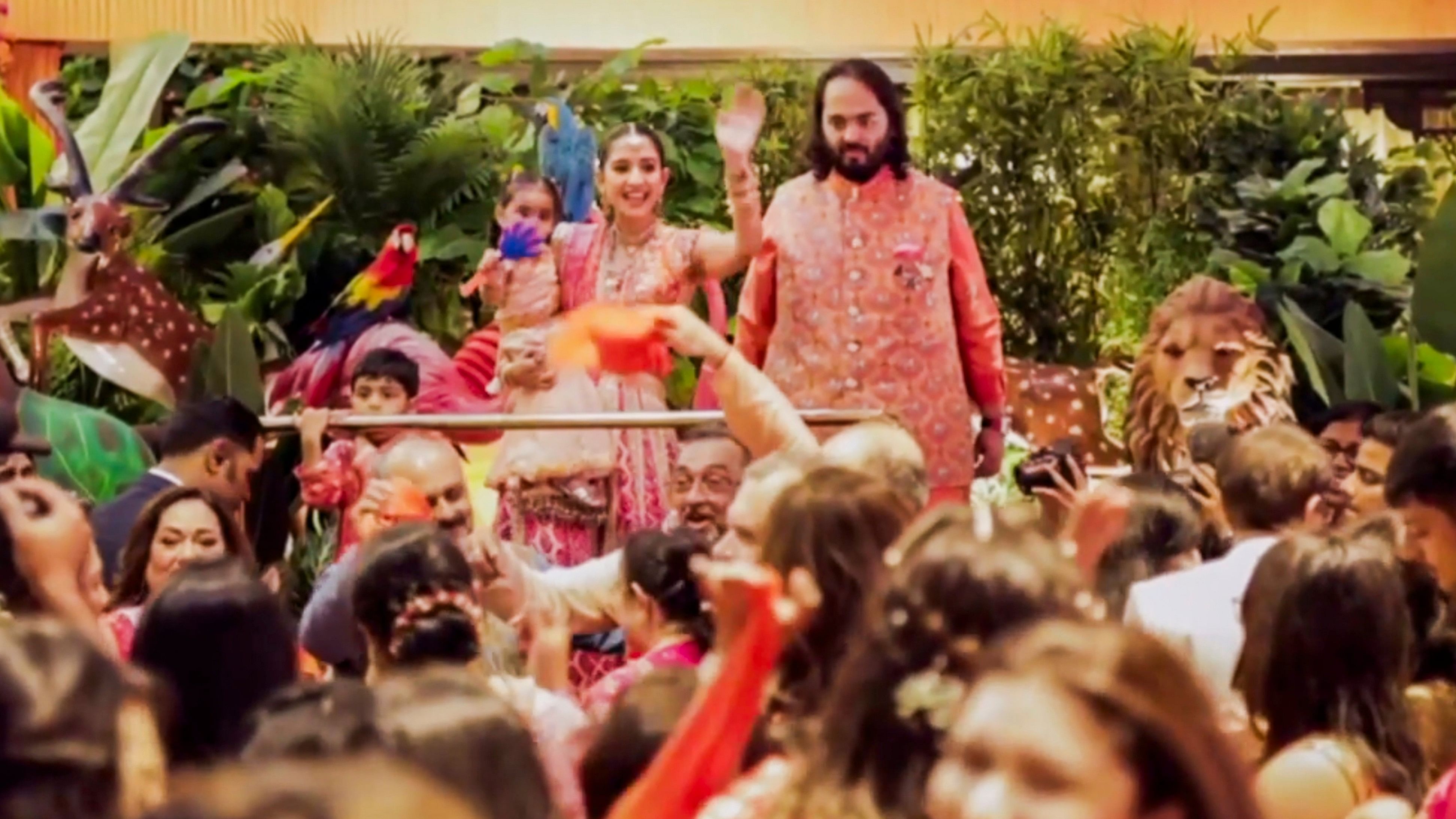 <div class="paragraphs"><p>Anant Ambani, Reliance Industries Chairman Mukesh Ambani's son, and Radhika Merchant during a ceremony ahead of their wedding, at Antilia.</p></div>