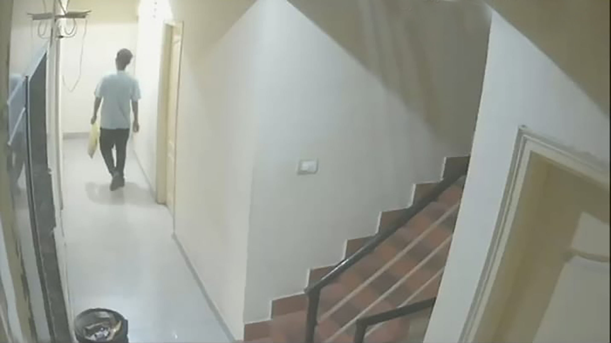 <div class="paragraphs"><p>CCTV footage from inside the PG, accessed by DH, shows the suspect wearing a blue T-shirt and black joggers walking towards the victim’s room with a polythene bag. </p></div>