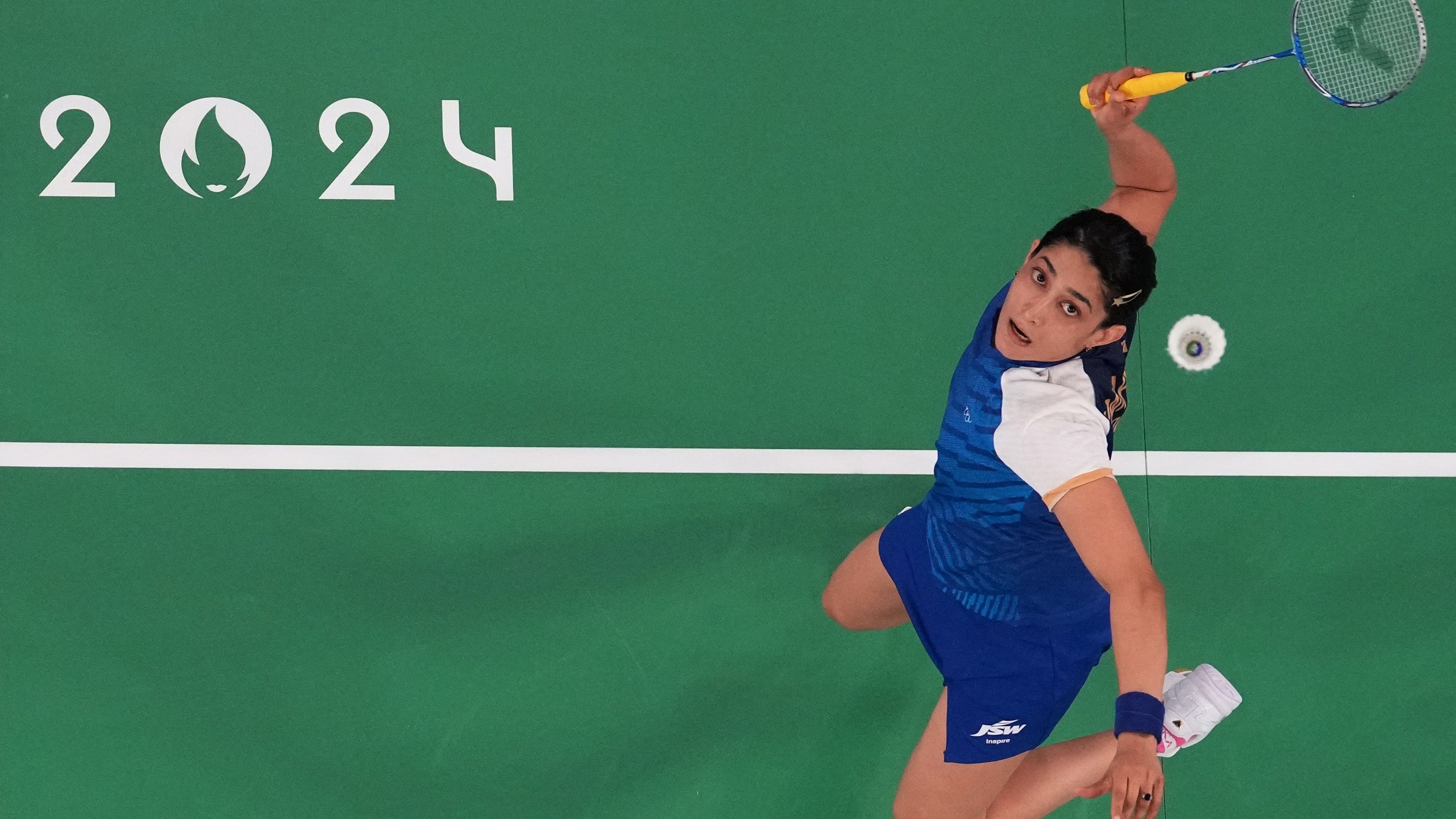 <div class="paragraphs"><p>Ashwini Ponnappa of India in action during the Group C match with Tanisha Crasto of India against So Yeong Kim of South Korea and Hee Yong Kong of South Korea</p></div>