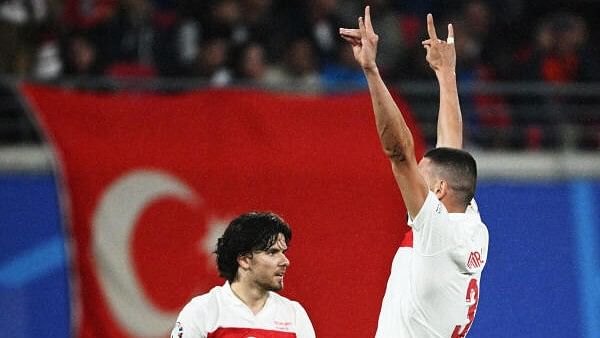 <div class="paragraphs"><p>Turkey's Merih Demiral celebrates scoring their second goal with a 'wolf' salute</p></div>