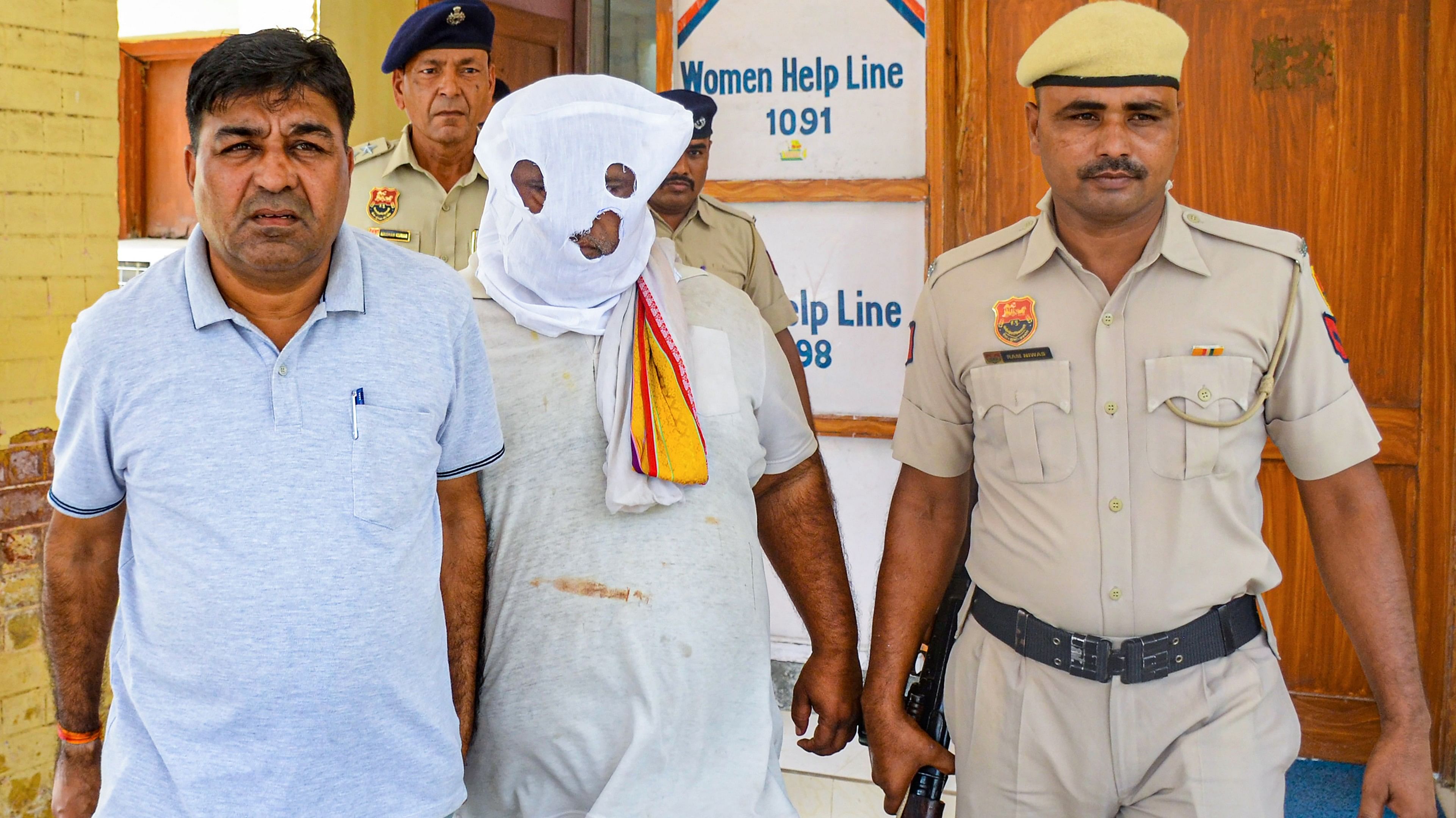 <div class="paragraphs"><p>Bittu Bajrangi, accused in Nuh violence case, being produced at a court following his arrest, in Nuh district on Aug. 17, 2023.</p></div>