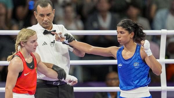 <div class="paragraphs"><p>India's Nikhat Zareen (blue) after winning the Women’s 50kg Boxing event against Germany’s Maxi Karina Kloetzer at the Summer Olympics 2024, in Paris, France, Sunday.&nbsp;</p></div>