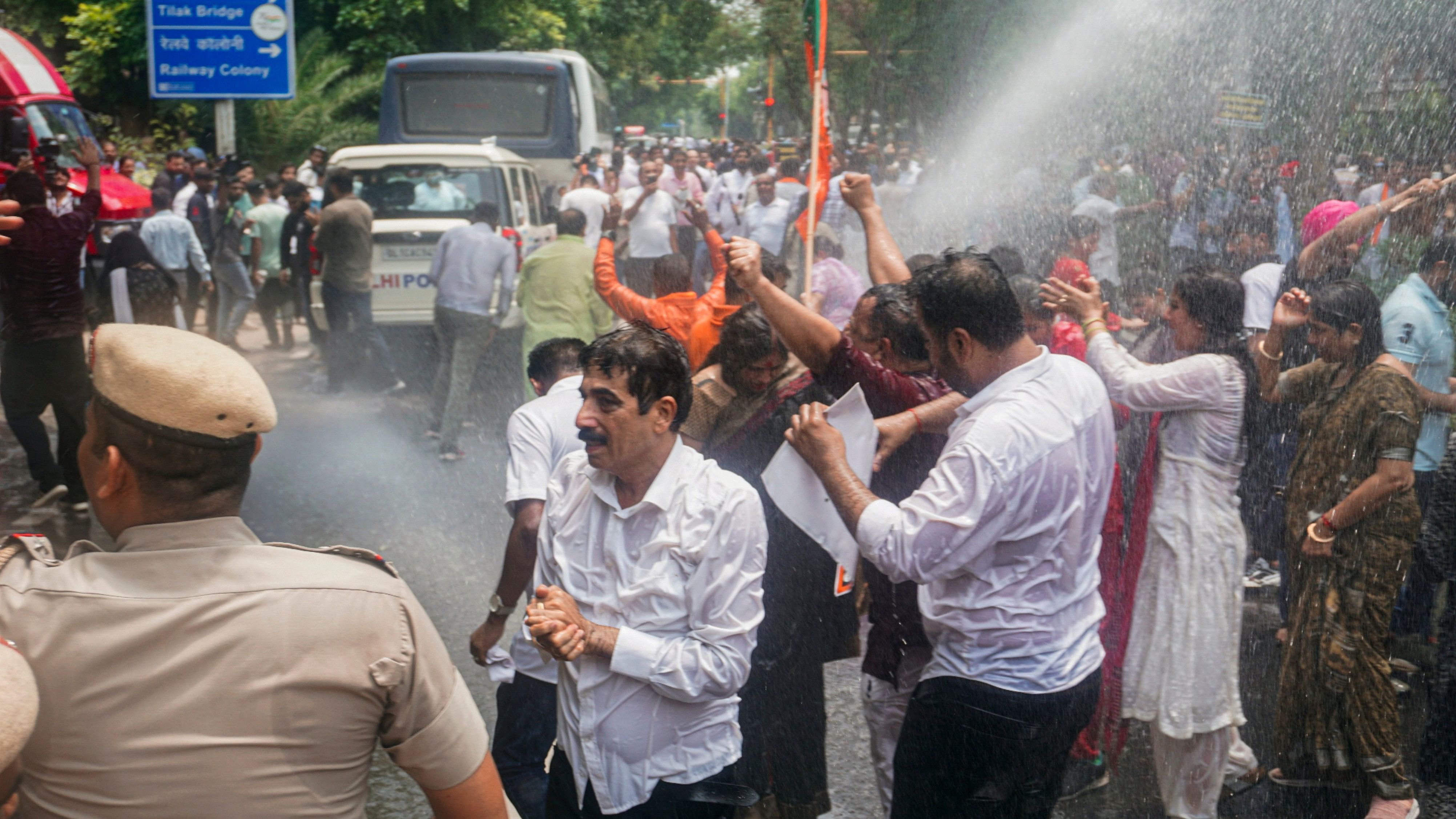 <div class="paragraphs"><p>Police use a water cannon to disperse BJP workers protesting against the Delhi government over the death of 3 civil services aspirants in Old Rajinder Nagar area, in New Delhi, Monday, July 29, 2024. </p></div>