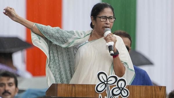 <div class="paragraphs"><p>West Bengal Chief Minister Mamata Banerjee addresses during TMC Martyr's Day rally, in Kolkata, Sunday, July 21, 2024.</p></div>