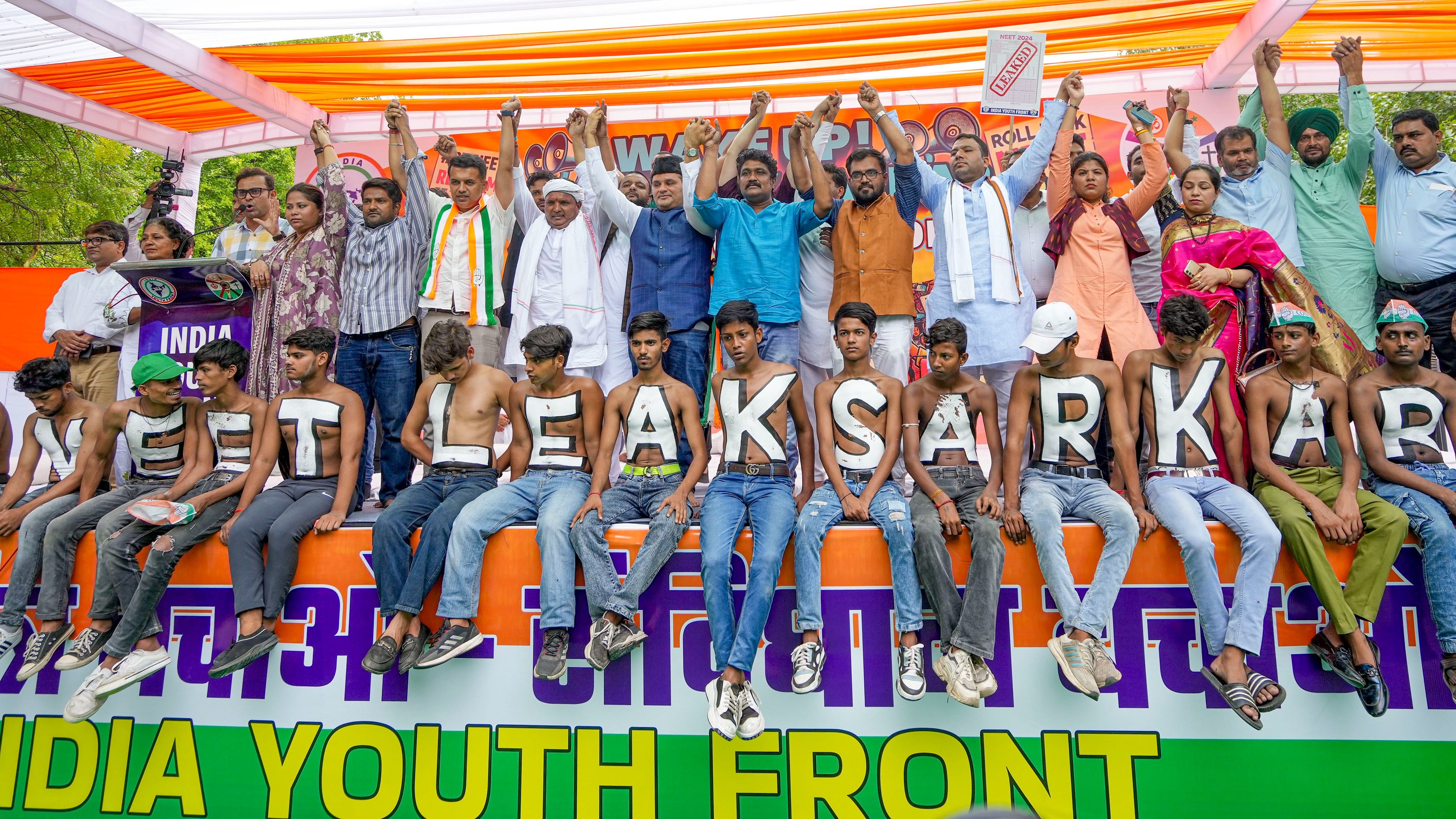 <div class="paragraphs"><p>Members of India Youth Front, an umbrella group representing INDIA bloc parties' youth wings, stage a protest over the alleged irregularities in NEET 2024 results, at Jantar Mantar, in New Delhi, Monday</p></div>