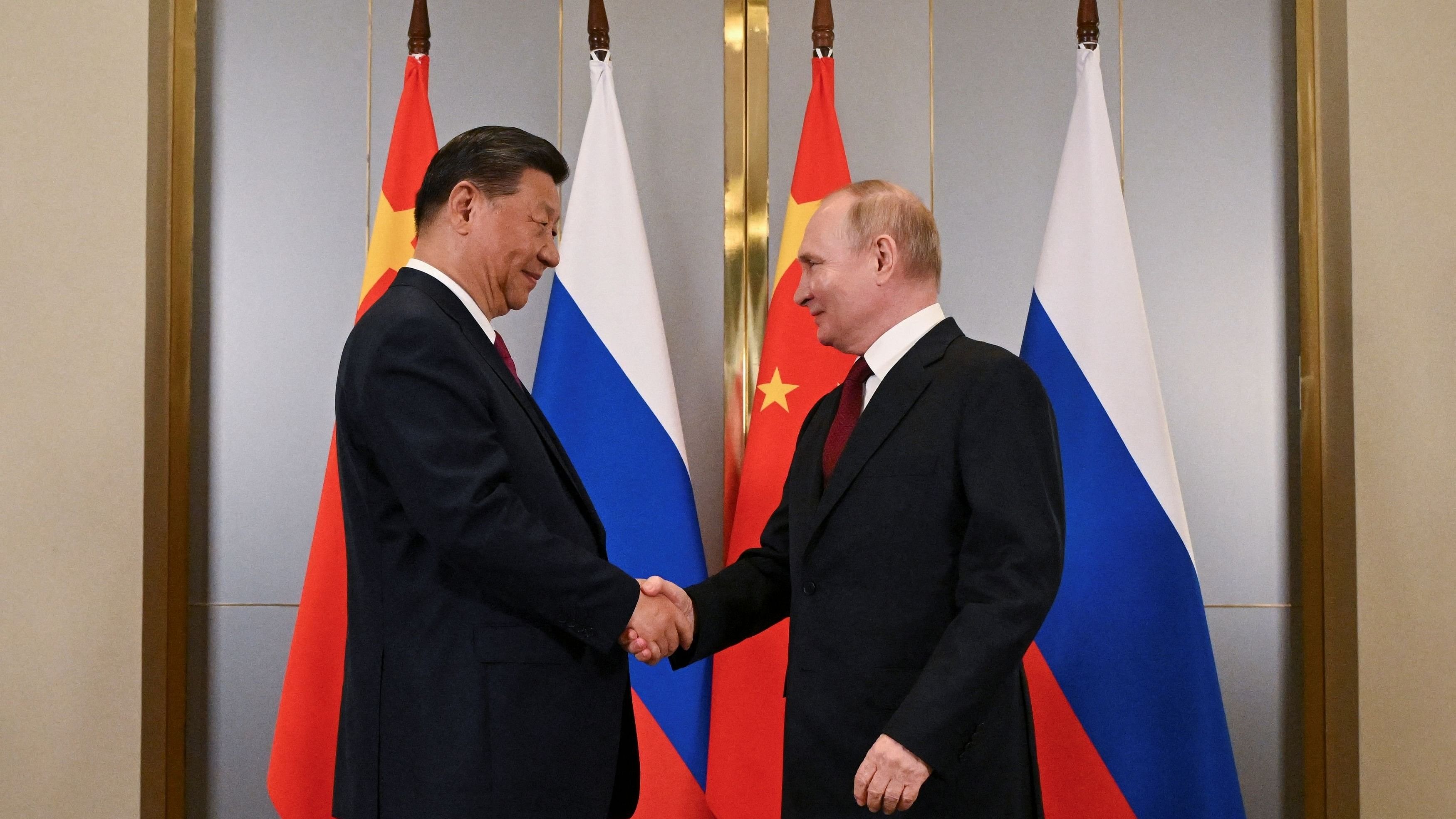 <div class="paragraphs"><p>Russian President Vladimir Putin and Chinese President Xi Jinping attend a meeting on the sidelines of the Shanghai Cooperation Organization  summit in Astana, Kazakhstan July 3, 2024.</p></div>