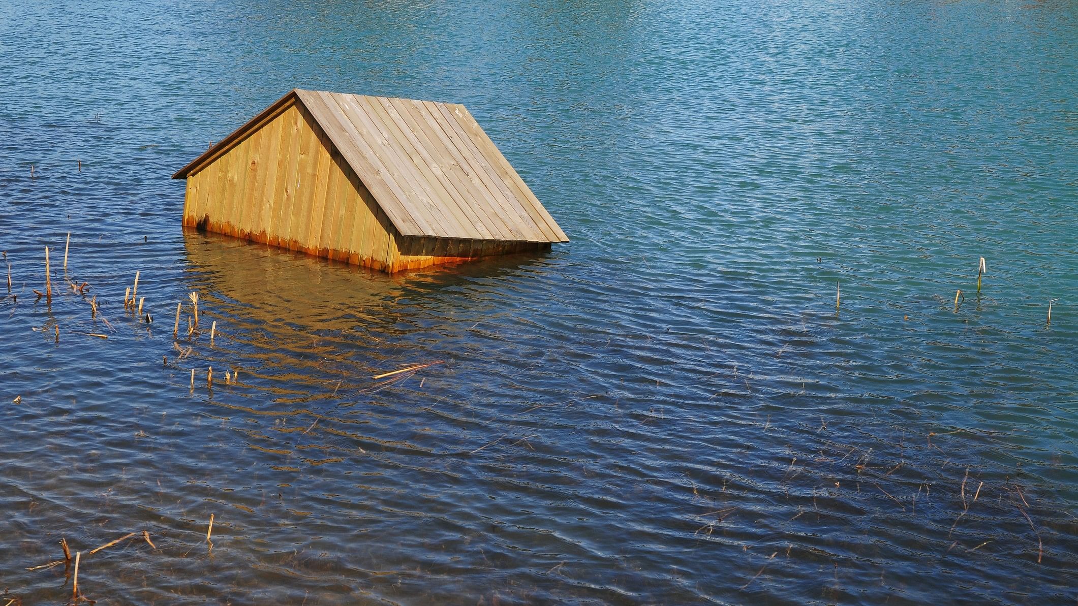 <div class="paragraphs"><p>Representative image of a hut submerged in water.</p></div>