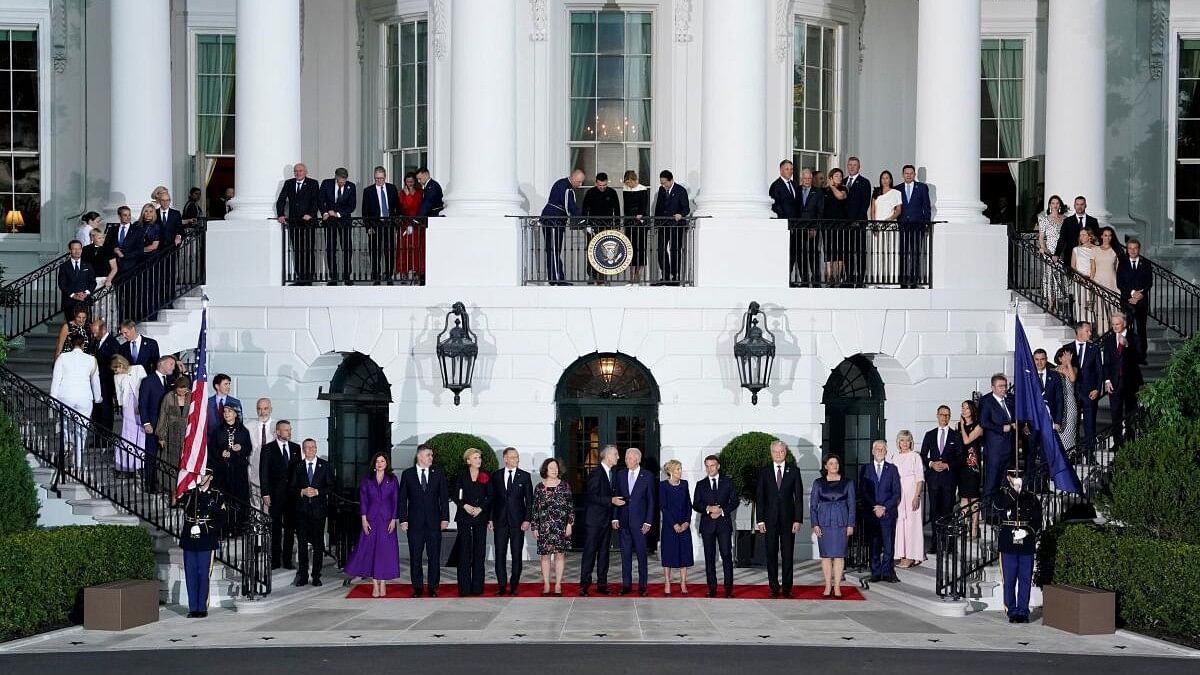 <div class="paragraphs"><p>US President Joe Biden, his wife Jill Biden, NATO Secretary General Jens Stoltenberg and his wife Ingrid Schulerud stand with other NATO allies and partners during a ceremony ahead of a dinner at the White House during NATO's 75th anniversary summit in Washington, US.</p></div>