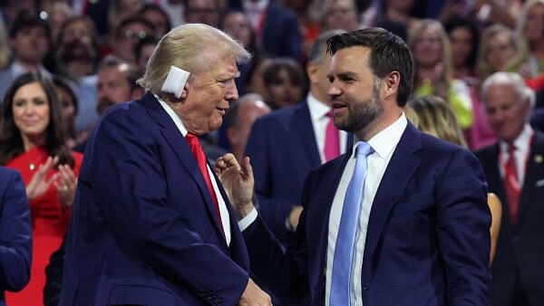 <div class="paragraphs"><p>Republican presidential nominee and former US President Donald Trump and Republican vice presidential nominee J.D. Vance shake hands during Day 1 of the Republican National Convention (RNC), at the Fiserv Forum in Milwaukee, Wisconsin, US, July 15, 2024</p></div>