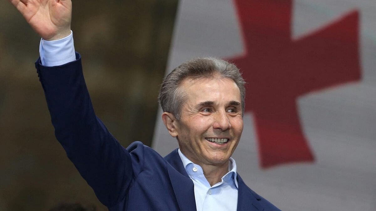 <div class="paragraphs"><p>Bidzina Ivanishvili, former prime minister and founder of the Georgian Dream party, waves during a pro-government rally in support of a bill on "foreign agents" in Tbilisi.</p></div>