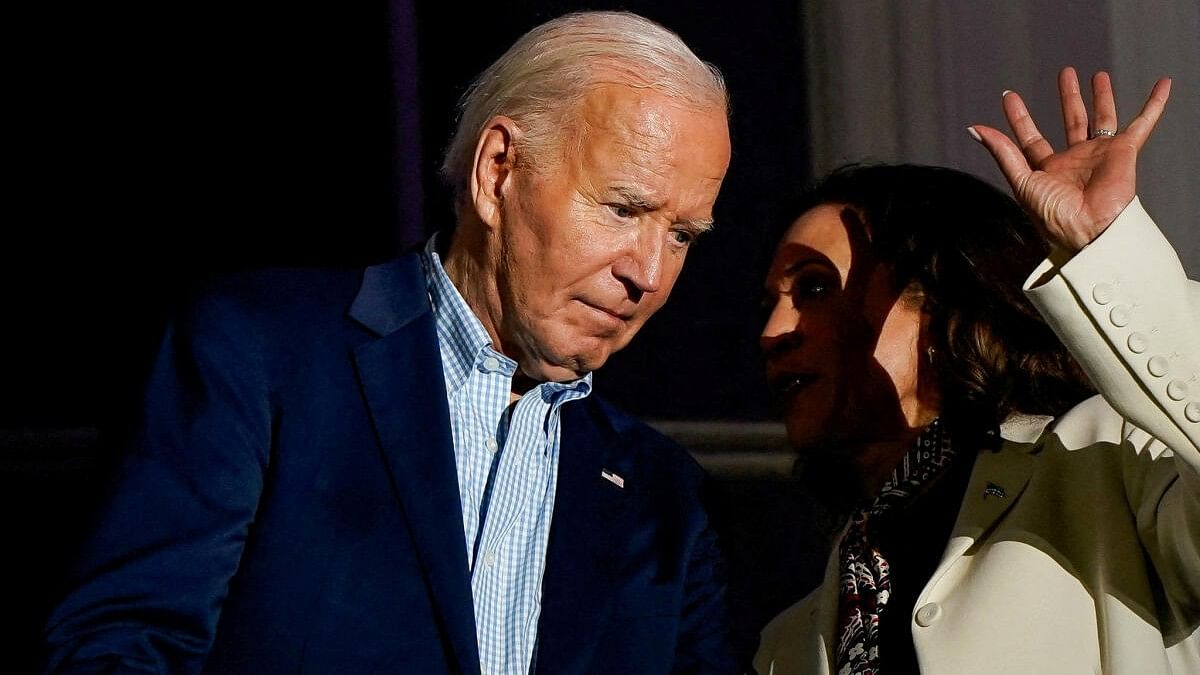 <div class="paragraphs"><p>US Vice President Kamala Harris speaks with President Joe Biden on a White House balcony during an Independence Day celebration in Washington, US, July 4, 2024.</p></div>