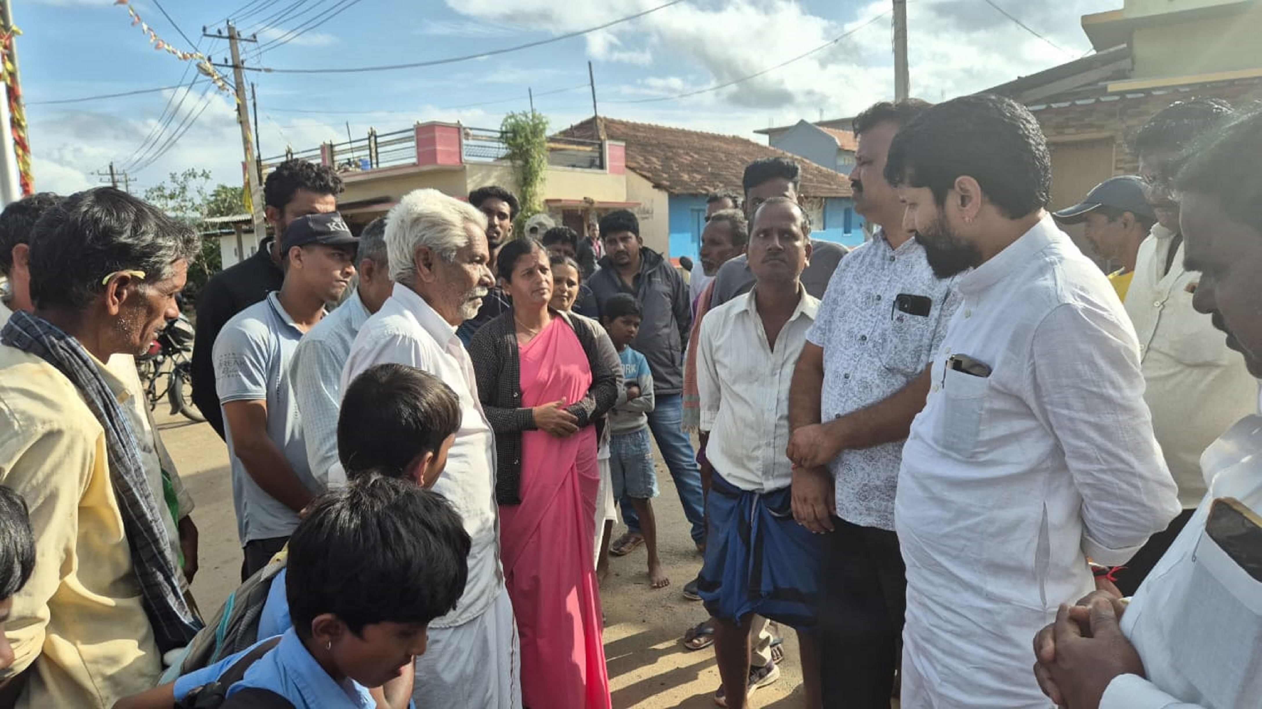 <div class="paragraphs"><p>MLC C T Ravi inquires about the health of villagers in Devagondanahalli.</p></div>