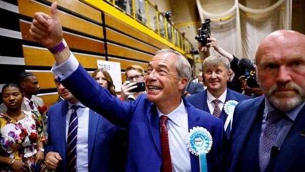 <div class="paragraphs"><p>Britain's Reform UK Party Leader Nigel Farage gestures as he walks after winning his first seat in parliament during the UK election in Clacton-on-Sea, Britain, July 5, 2024.</p></div>